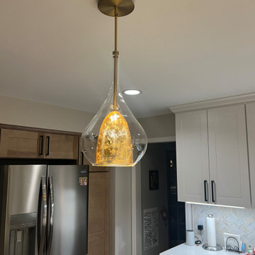 Elegant Gold-Leaf Pendants Encased in Glass