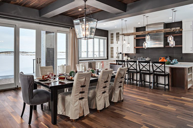 Design ideas for a large transitional dining room in Calgary with medium hardwood floors.