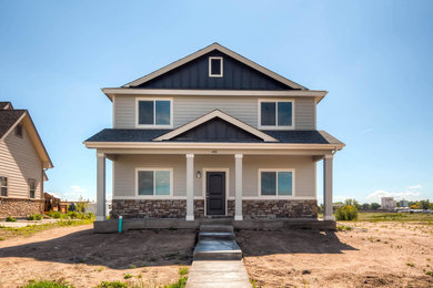 Elegant gray two-story exterior home photo in Denver
