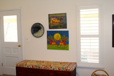 Small cottage chic enclosed living room photo in Other