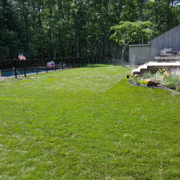 Backyard Makeover Installing Sod, Privacy Hedge, Flower Garden, Gravel Driveway