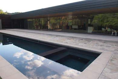 Inspiration for a modern gray concrete fiberboard exterior home remodel in Santa Barbara