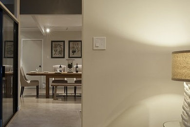 Example of a mid-sized mid-century modern hallway design in San Francisco with beige walls