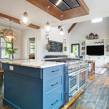 Family Farm - Kitchen with Living Room and Dining beyond