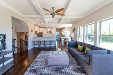 Large transitional formal and open concept dark wood floor and brown floor living room photo in Chicago with beige walls, a standard fireplace, a stone fireplace and a tv stand