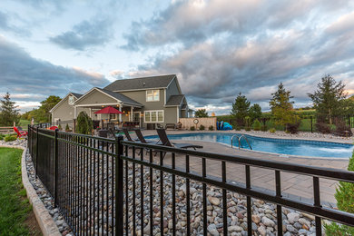 Inspiration for a timeless pool remodel in New York