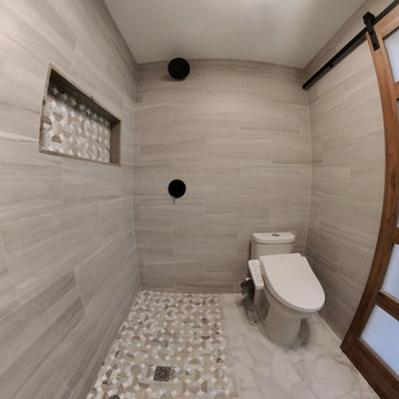 Modern Curbless Walk-In Shower & Bidet Suite with Geometric Tile