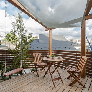 横浜のアジアンスタイルのおしゃれなデッキ (オーニング・日よけ) の写真
