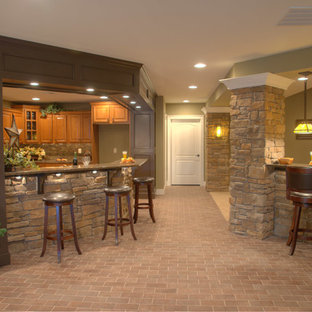 Photo of an expansive classic basement in Other with green walls and brick flooring.