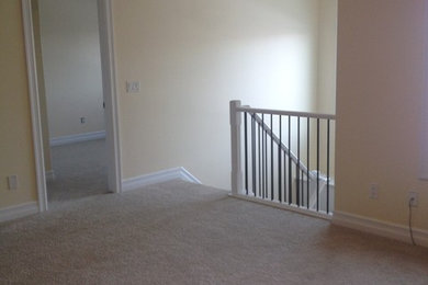 Inspiration for a transitional staircase remodel in Edmonton