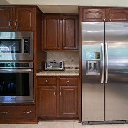 Bath in HomeCrest, Laurel Sq., Maple, Sorrel, Ebony - Kitchen Cabinetry
