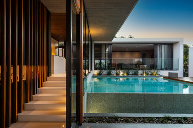 Photo of a modern pool in Gold Coast - Tweed.