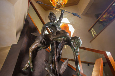 Example of an arts and crafts staircase design in Orange County