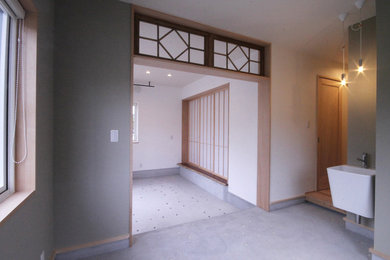 他の地域にあるおしゃれな玄関の写真