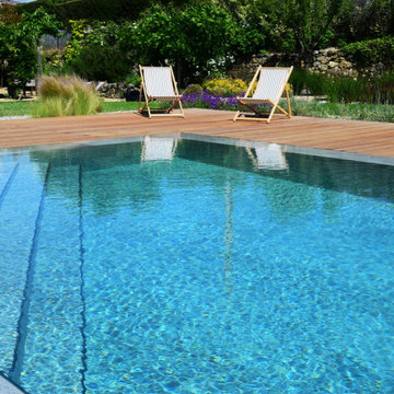 Transformation, rénovation et agrandissement d’une piscine contemporaine