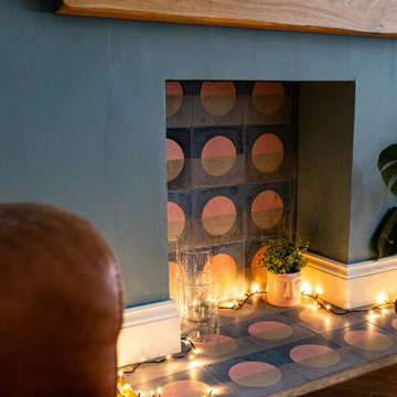 Living room fireplace with patterned tiles
