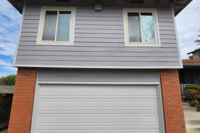 New garage with exterior paint and siding