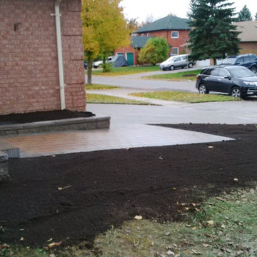 New front veranda, garden bed, walkway, re-lay driveway