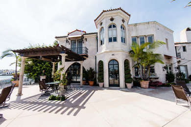 Example of a tuscan exterior home design in Orange County