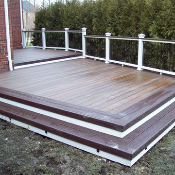 TREX TRANSCENDS SPICED RUM WITH VINTAGE LANTERN BORDER & WHITE TREX RAILING