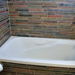Island Stone copper quartzitic slate bathroom with linear interlock - Tile