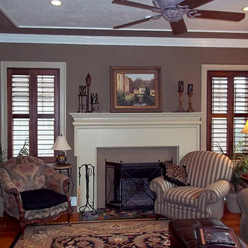 Stained Shutters on White Casement Windows