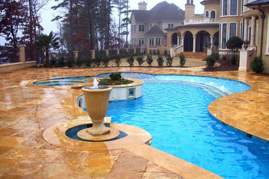 Large eclectic backyard tile and custom-shaped hot tub photo in Charlotte