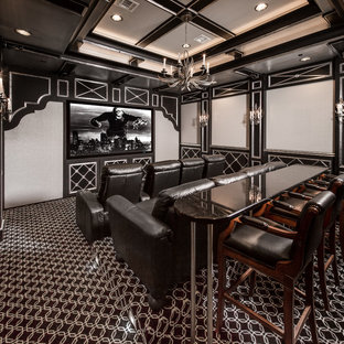 Photo of a mediterranean home cinema in Houston with black walls, carpet, a built-in media unit and multi-coloured floors.