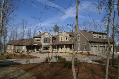 Large arts and crafts two-story concrete fiberboard exterior home photo in DC Metro