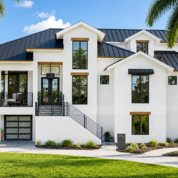 Modern Coastal Exterior Renovation with Warm Neutrals and Black Accents