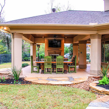 Extended Covered Patio with Fireplace and Dining Room