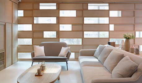 Visite Privée : Des panneaux coulissants dynamisent un penthouse