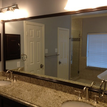 Rebuilt Bathroom with Walnut Stain Cabinets