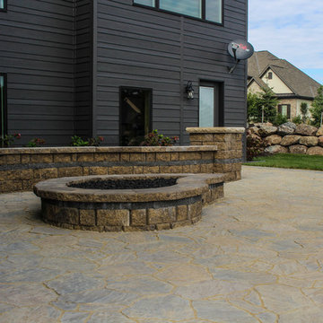 Side View of Tear Drop Fire Pit Including Fine Patio and Lawn