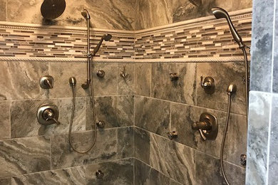 Inspiration for a mid-sized timeless master porcelain tile and brown floor bathroom remodel in Other with beige walls