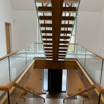 New Monostring Staircase | Oak Box Treads & 15mm Glass | Chorley