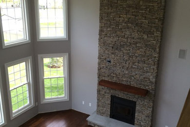 Stone Fireplace and Hardwood Flooring