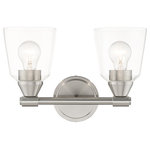 Livex Lighting - Catania 2-Light Brushed Nickel Vanity Sconce - The clean and simple Catania vanity sconce features a brushed nickel finish with hand blown clear glass. This sleek design will brighten up any bathroom.