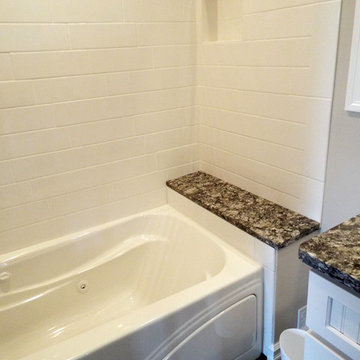 Sparkling White Bathroom with Azul Aran Granite and Porcelain