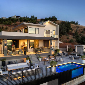 A little farm below a hillside resort-style off-the-grid view home