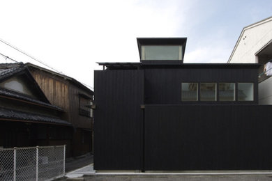 Design ideas for a contemporary home design in Kobe.
