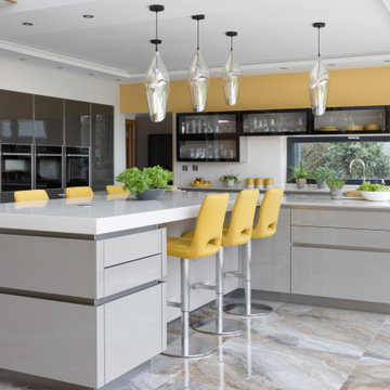 Contemporary Handleless Intuo Glass-fronted Kitchen with T-shaped Island