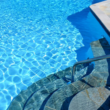 Kid Friendly Tropical Poolside Backyard