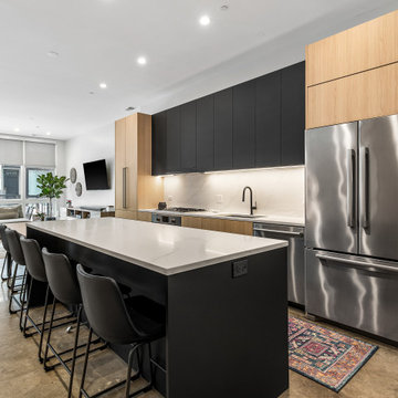Sophisticated matte black and warm rift cut oak collision