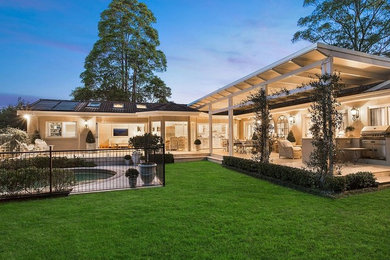 Inspiration for a mid-sized mediterranean home design in Sydney.
