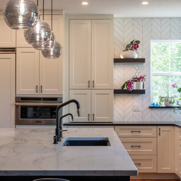 Boulder County Luxury Kitchen Remodel with Quartzite Island & Custom Cabinetry