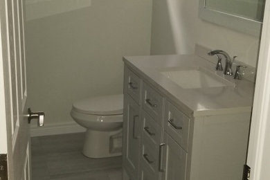Bathroom - mid-sized contemporary kids' white tile and ceramic tile porcelain tile and single-sink bathroom idea in Toronto with a niche and a freestanding vanity
