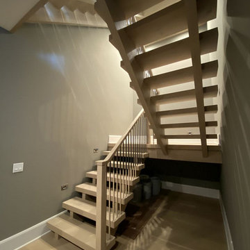 White Oak Stairs with Polished Stainless Steel Balusters