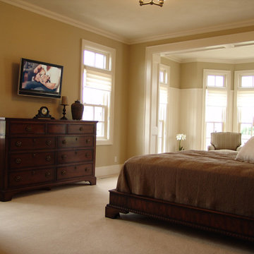 Television Installation in Master Bedroom with Seating Area