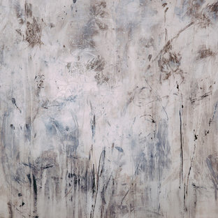 Photo of a large modern home office and library in Edmonton with grey walls, ceramic flooring and a hanging fireplace.